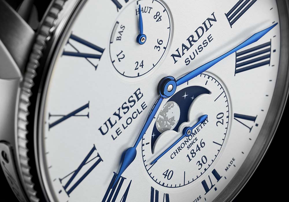 ulysse nardin marine torpilleur moonphase white dial closeup